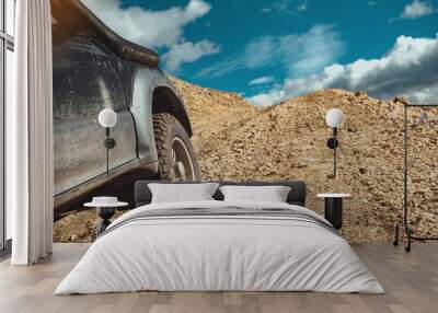 4x4 off road ready car goes uphill Wall mural