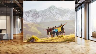 Group of happy friends against mountains Wall mural