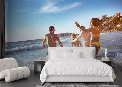 Happy friends sea beach holidays Wall mural