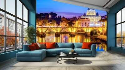 The dome of Saint Peters Basilica and Vatican City at dusk. Sant'Angelo Bridge over the Tiber River. Rome, Italy Wall mural