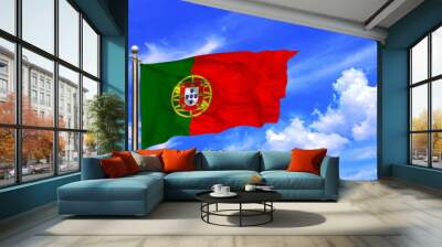 Portugal Green Red National Flag Waving In The Wind On A Beautiful Summer Blue Sky Wall mural