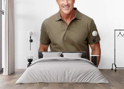 Front view mid shot of a 60-year-old handsome White man dressed in a muted olive green polo shirt and khaki trousers, smiling on a white transparent background Wall mural