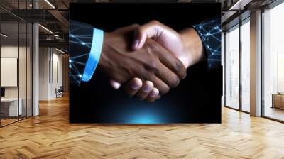 Two business people shaking hands in agreement. Wall mural