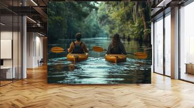 Romantic tandem kayaking adventure with a couple paddling through serene waters Wall mural