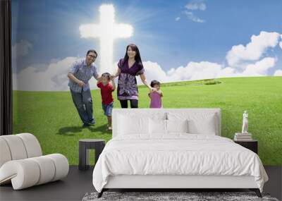 Catholic family at the Cross Wall mural