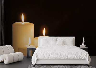 Christmas white candles in the dark background Wall mural