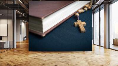 Closeup of the holy book bible and cross Wall mural