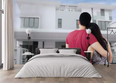 Couple looking at new home Wall mural