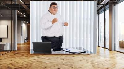 Fat businessman cheering and dancing for his work Wall mural