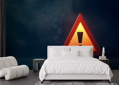 3D rendering of a triangular warning sign with an exclamation mark on a dark background Wall mural