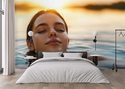 Beautiful young woman relaxing in the water of a lake, enjoying a summer vacation at a natural spa pool Wall mural