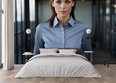 Photo of a female model wearing a corporate professional shirt with part of the shirt made of denim and the rest of the shirt made of cotton. Wall mural