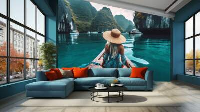 Woman wearing a hat and travelling on a boat through Asia. Thailand. Summer holiday and vacation concept Wall mural