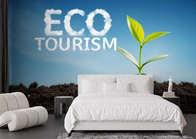 Plant with globe representing eco tourism and sustainable travel promoting green living and environmental awareness Wall mural