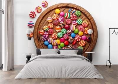 Board and plate of tasty Candy with on white background. Wall mural