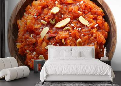 Board and plate of tasty Gajar Halwa with on white background. Wall mural