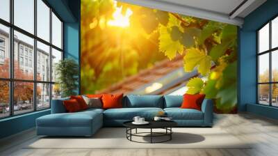 Green leaves and roof of the house in the rays of the sun Wall mural