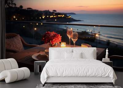 Romantic dinner on the terrace overlooking the sea at sunset. Wall mural