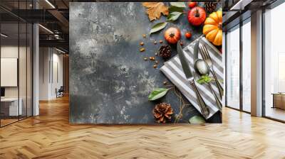 Serving for Thanksgiving dinner with napkin, cutlery and pumpkins top view Wall mural