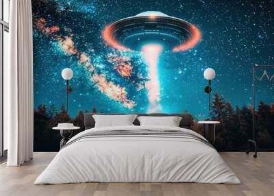 A glowing UFO hovers over a forest, emitting a bright light beam that illuminates the surrounding trees and sky. The night sky is filled with stars.  Wall mural