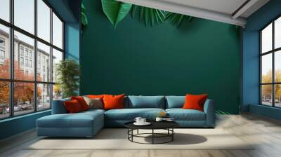 Tropical leaves frame a green background, creating a vibrant and lush backdrop for your designs. Perfect for summer themes, travel, nature, and more. Wall mural