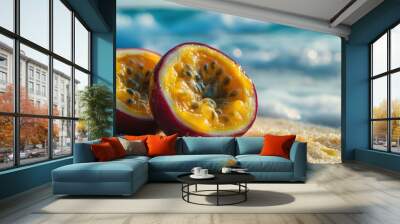 Passion fruit halves on a sandy beach, with ocean waves in the background, blending tropical vibes and natural beauty Wall mural