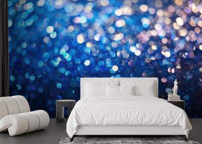 Blue sequin background featuring holiday themed abstract glitter with sparkling lights Brightly colored fabric sequins create a defocused fashion look Wall mural