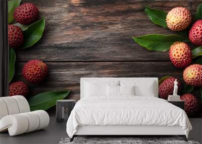 Lychee with leaves tropical fruit isolated on a wooden table Wall mural