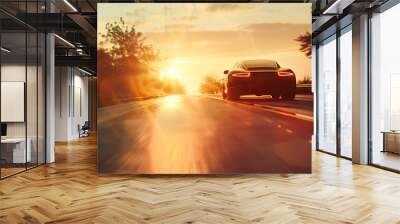 Modern car fast drive on asphalt road at sunset Wall mural