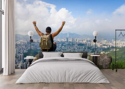 Man enjoying Hong Kong view from the Lion rock Wall mural