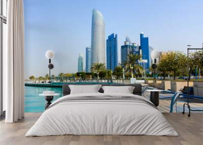 Modern buildings of downtown Abu Dhabi view from the walking area by the seaside Wall mural