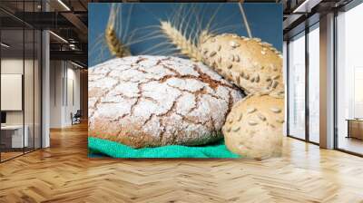 Rye bread loaves and wheat plant Wall mural