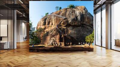 Sigiriya ancient Lion rock fortress in Sri Lanka with tourists Wall mural