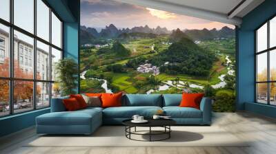 Stunning sunset over karst formations landscape near Yangshuo China Wall mural