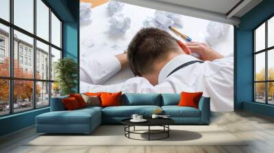 tired architect sleeping on his project Wall mural