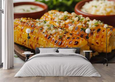 Mexican elote, grilled corn with cheese, isolated on white background, traditional Mexican dish, simple and clean presentation Wall mural