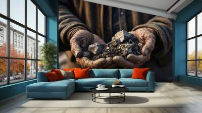 Miner hands holding lithium rocks extracted from rock ore. Mining for lithium, a key component of batteries Wall mural