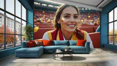 Spanish woman fan supporting Spain national football team. Sports fan celebrating championship victory in a sports stadium Wall mural