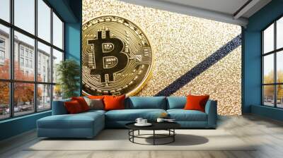 close-up of golden Bitcoin coins on a gold background Wall mural