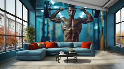 Full body of strong young muscular male athlete in activewear lifting barbells during intense workout in modern gym Wall mural