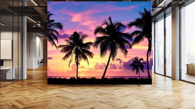 Tropical palm trees at sunset Wall mural