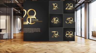 set of anniversary logotype golden color with glitter on black color background for special celebration event Wall mural