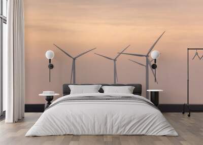 Closeup of windmills with a beautiful sky in the background Wall mural