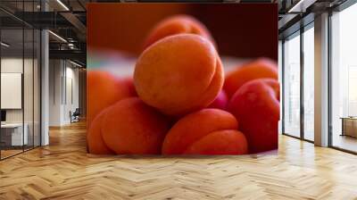 Close-up juicy heap of apricots  Wall mural