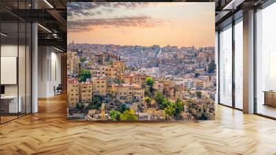 Beautiful view with many apartment buildings at sunset in Amman, Jordan. Wall mural