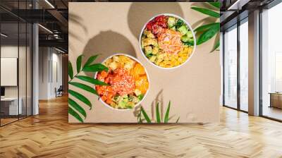 Hawaiian traditional food poke bowl on sand Wall mural