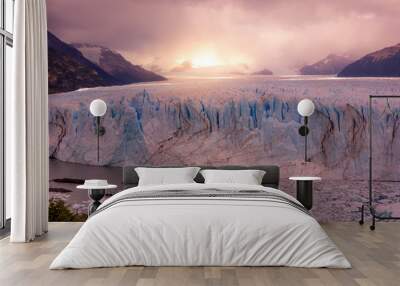 lake in the middle of a glacier with pieces of icebergs coming out of the water Wall mural