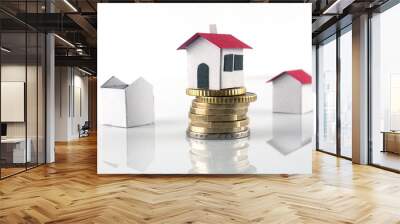 Mortgage and loan concept: three paper house and a coin pile Wall mural