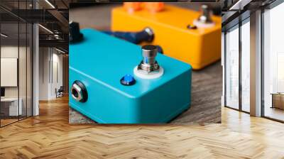 Two guitar pedals effect on wood floor Wall mural