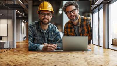 Industrial workers. a Builder with a beard wearing a protective vest and a hard hat Wall mural